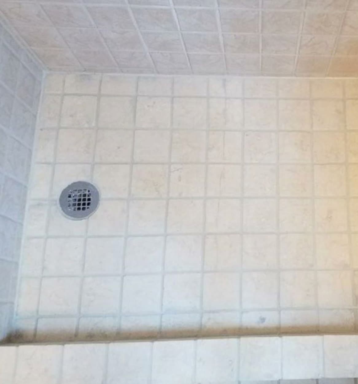 Clean bathroom tile and grout after professional mould removal — Camden London
